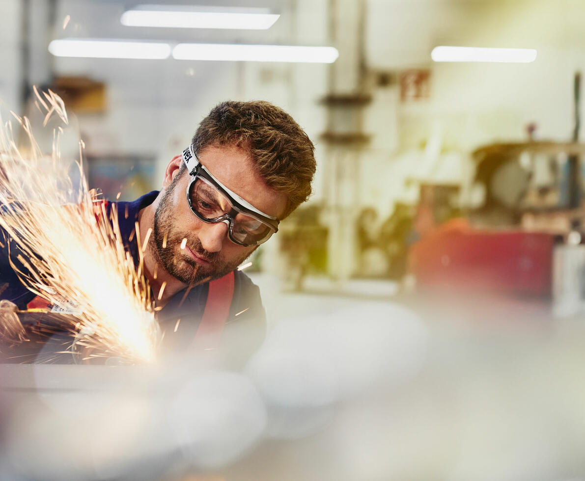 A man working with a tool