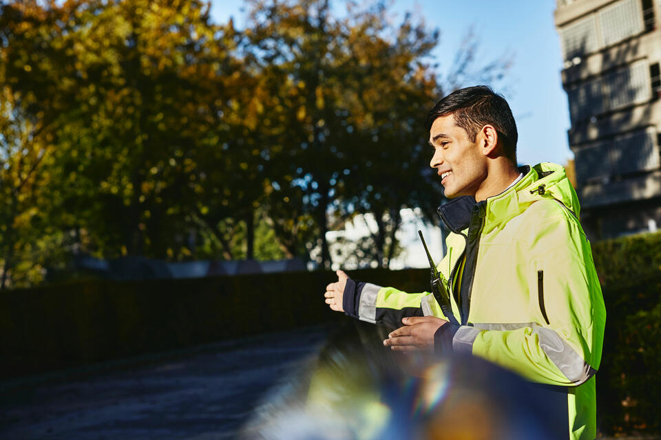 A man in a fluorescent jacket